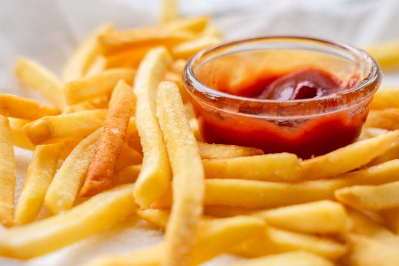 crispy seasoned fries with dipping sauce