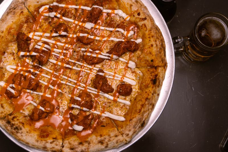 spicy buffalo pizza with jalapenos and ranch